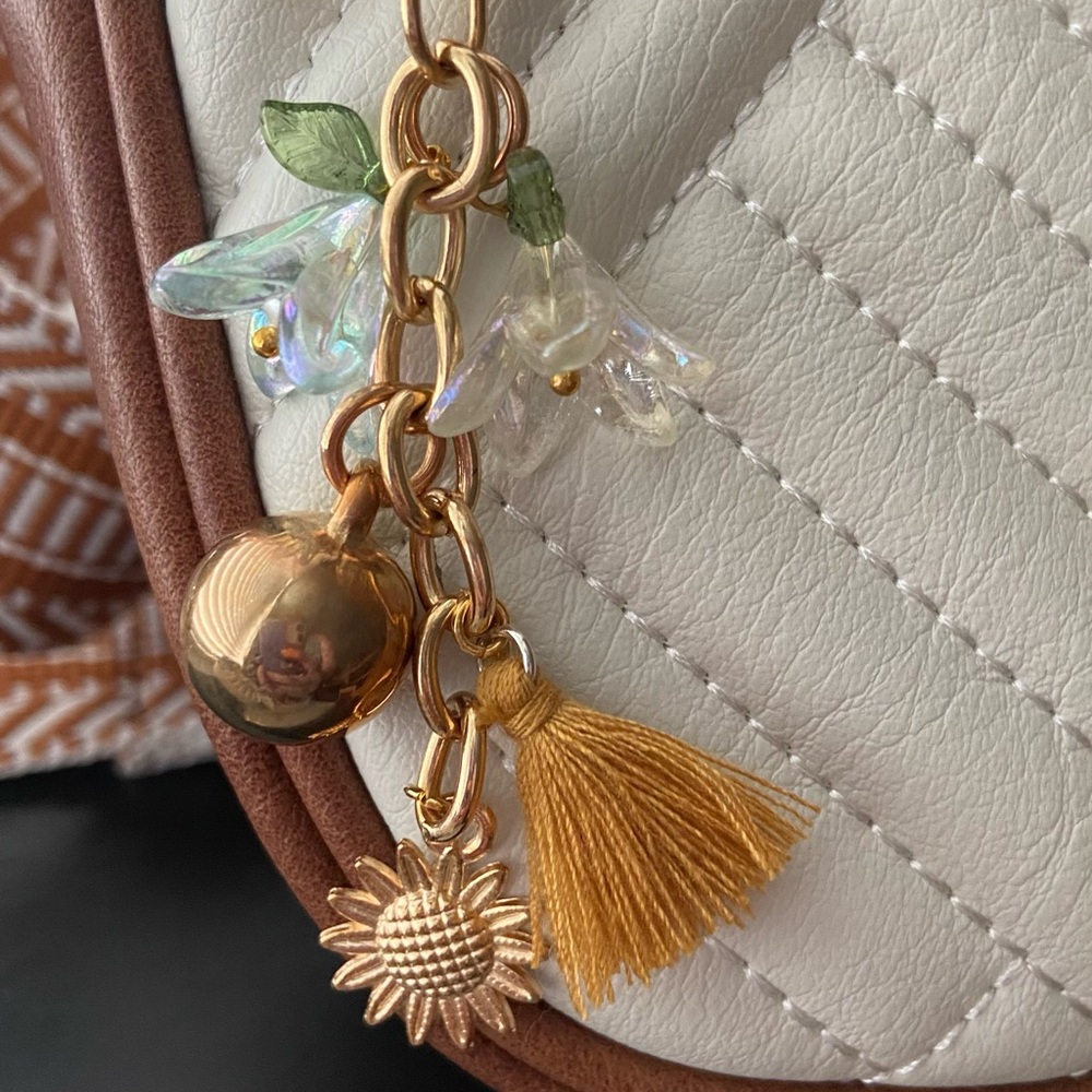 White and Gold Key Holder with Decorative Charms